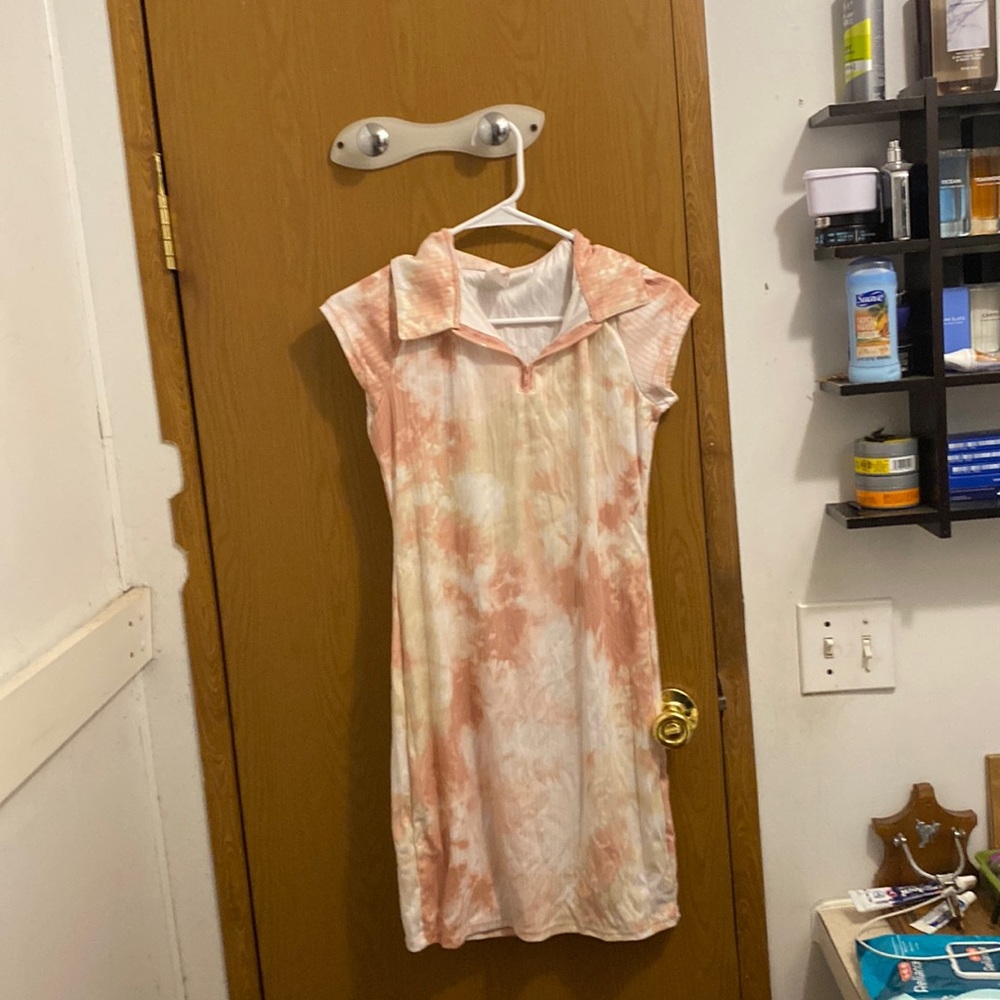 NWOT NEVER BEEN WORN. Cute little party dress.
